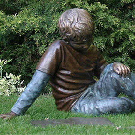 Hollow Cast Bronze Figure : Toby Reading a Comic