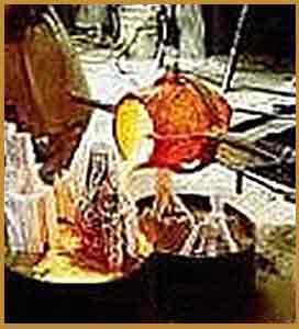 Pouring Molten Bronze from a Crucible : Escar UK Bronze